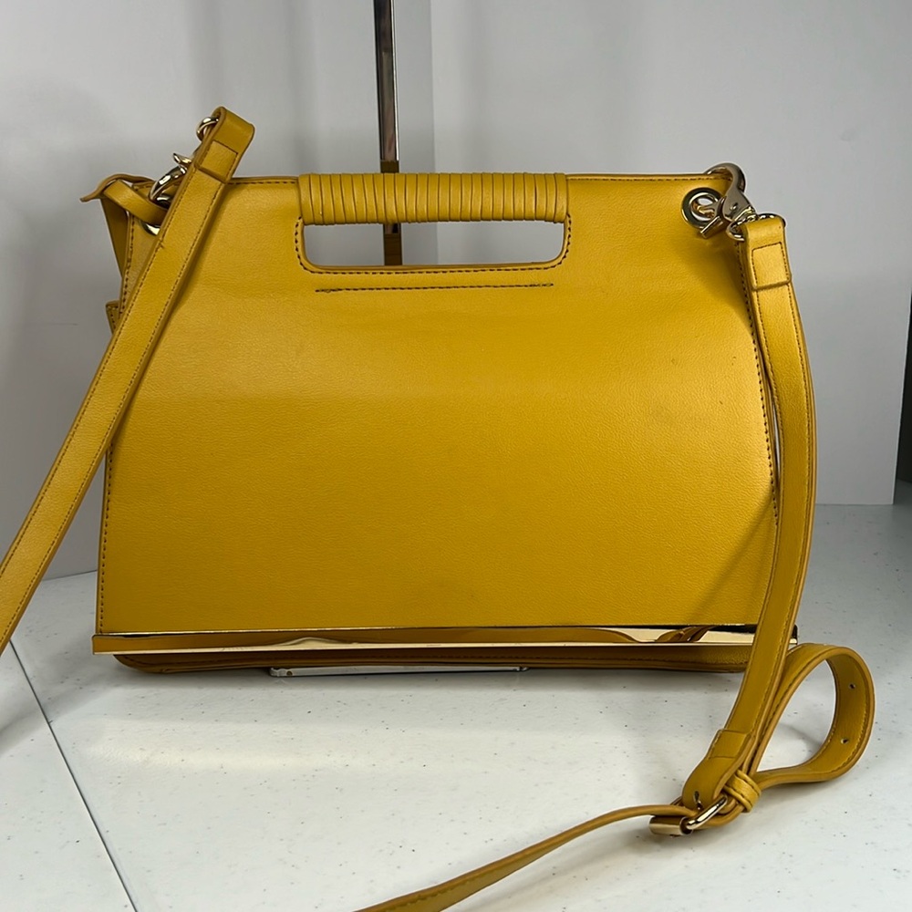 Andrea envelope bag with gold accent on flap.  Crossbody.
